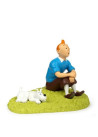 Tintin Assis dans l'Herbe